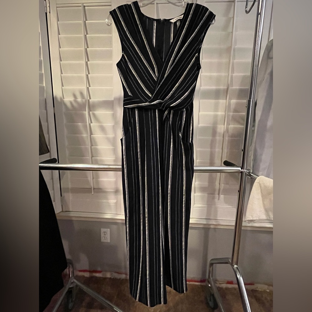 Women’s romper. New with Tags.  Navy with white stripes.